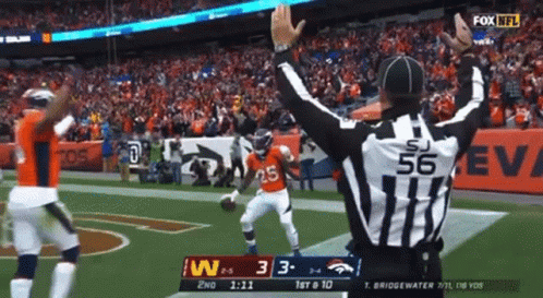 A Referee With The Number 56 On The Back Of His Shirt GIF