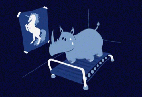 A Rhino Is Running On A Treadmill In Front Of A Unicorn Poster GIF