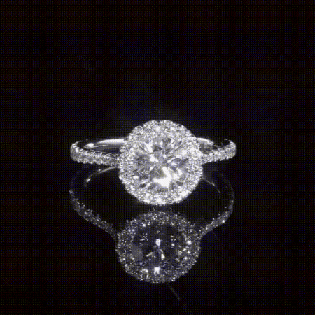 a ring with a round diamond in the center