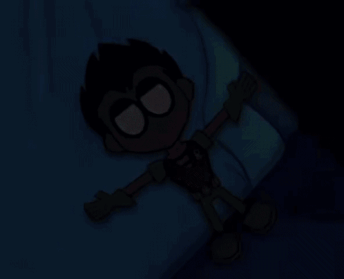 A Robin Cartoon Character Is Laying On A Bed With His Arms Outstretched GIF