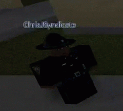 a roblox character wearing a hat and sunglasses is standing on the sidewalk .