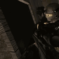 A Robot Is Holding A Gun In A Video Game GIF