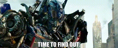 A Robot Is Standing In A City With The Words `` Time To Find Out '' Written Below It . GIF