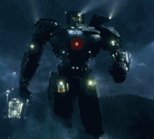 A Robot Is Standing In The Rain With A Red Light On Its Head GIF