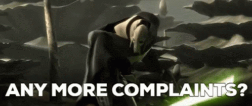 A Robot With A Green Lightsaber Is Asking For Any More Complaints GIF