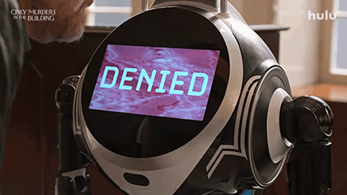 A Robot With A Screen That Says " Denied " GIF