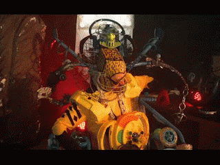 A Robot With A Yellow Shirt That Says ' Tiger ' On It 'S Chest GIF