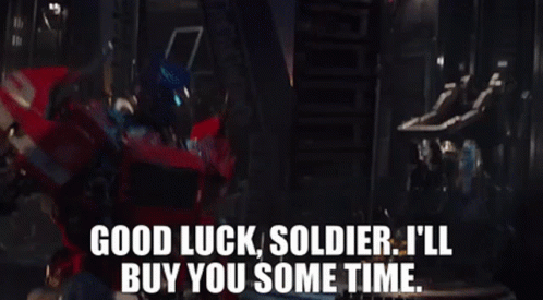 A Robot With The Words " Good Luck Soldier I 'Ll Buy You Some Time " GIF