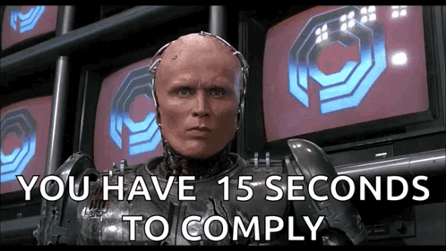 A Robot With The Words " You Have 15 Seconds To Comply " GIF