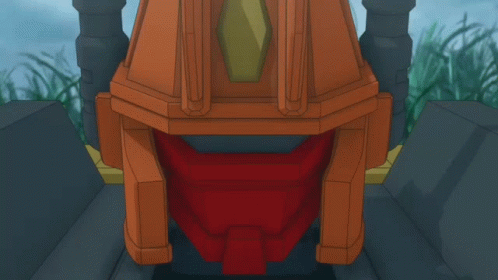 A Robot With Wings Is Standing In A Field Of Tall Grass GIF