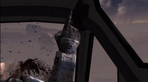 A Robotic Hand Giving The Middle Finger In A Dark Room GIF