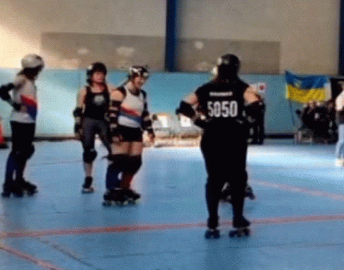 A Roller Derby Player Has The Number 5050 On The Back Of Her Shirt GIF