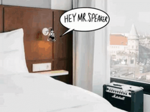 A Room With A Bed And A Speaker That Says Hey Mr Speaker GIF