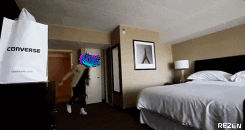 A Room With A Converse Bag And A Bed GIF