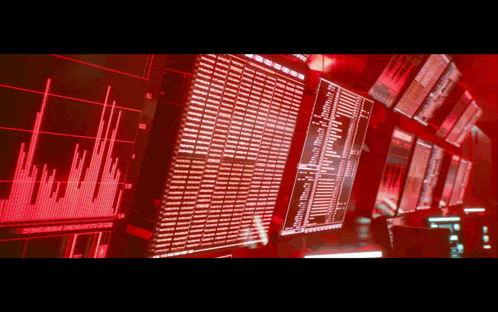 A Row Of Computer Monitors With One That Says ' U.s. ' On It GIF