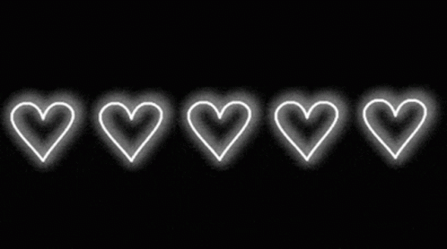 A Row Of White Hearts On A Black Background GIF