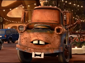 A Rusty Tow Truck With A License Plate That Says " Battery " GIF