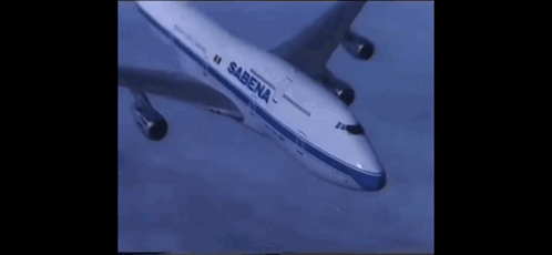A Sabena Airplane Is Flying Through The Sky GIF