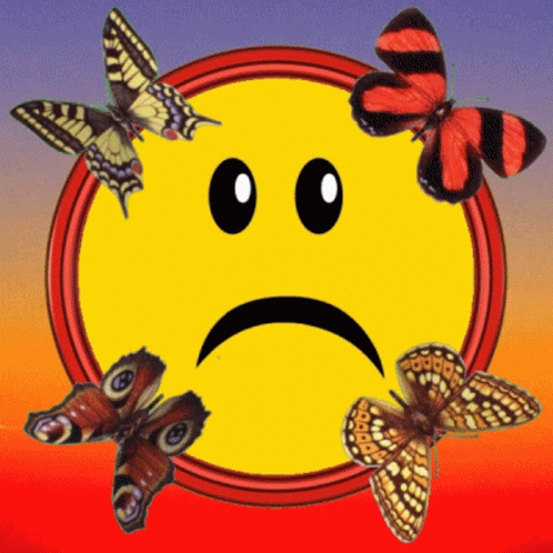 A Sad Face With Butterflies Around It GIF