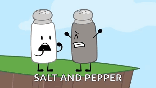 A Salt And Pepper Shaker Are Standing Next To Each Other On A Cliff . GIF