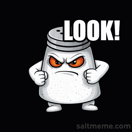 a salt shaker with an angry face and the words look a fat no written below it