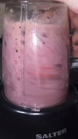 A Salter Brand Blender Filled With A Pink Liquid GIF