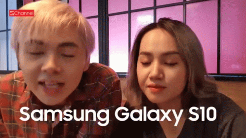 A Samsung Galaxy S10 Ad With A Man And Woman GIF