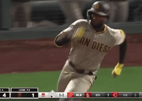 A San Diego Baseball Player Is Running On A Field GIF
