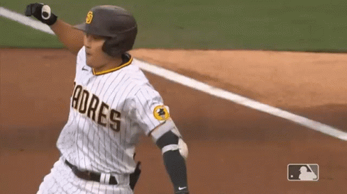 A San Diego Padres Baseball Player Is Running On The Base GIF