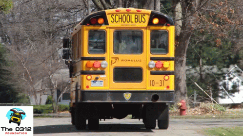 A School Bus With The Number 10-31 On It GIF