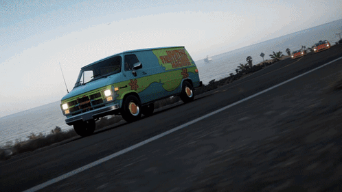 A Scooby Doo Van Drives Down The Road GIF