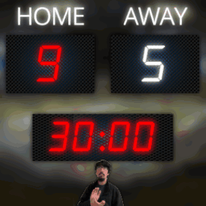 a scoreboard shows that home is 9 to 5 and away is 5 to 3