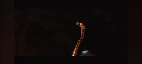 A Screen Shot Of A Video Game With Lava And Rocks In The Background GIF