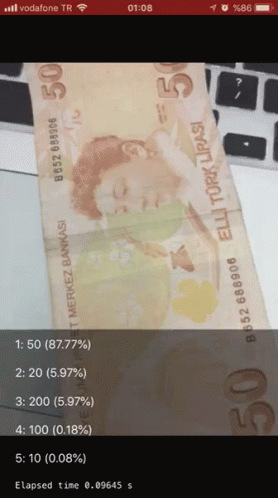 A Screenshot Of A 50 Tl Bill On A Cell Phone GIF