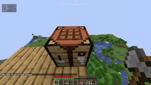 A Screenshot Of A Minecraft Game Shows A Large Wooden Block With A Red Top GIF
