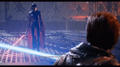 A Screenshot Of A Video Game Shows A Woman Holding A Lightsaber And A Man Looking On GIF
