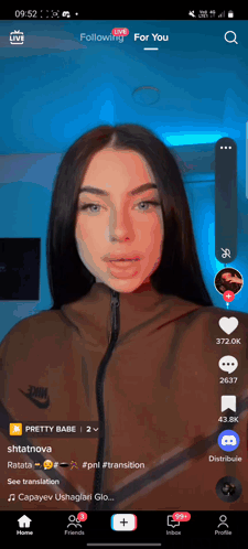 A Screenshot Of A Woman 'S Face On A Phone With A Following For You Button GIF