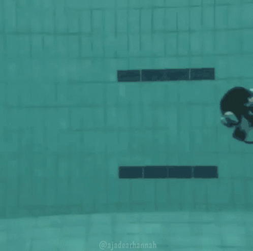 A Scuba Diver Is Swimming In A Pool With The Hashtag @Jadearhannah GIF