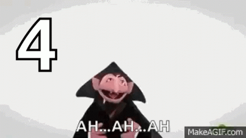 A Sesame Street Character Is Wearing A Black Hat And Saying `` Ah ... Ah ... Ah `` . GIF