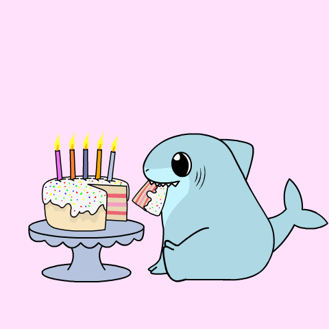 Shark Sitting Next To Birthday Cake GIF