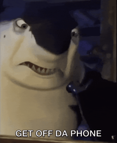 A Shark Talking On A Cell Phone With The Words Get Off Da Phone Below Him GIF