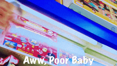 A Shelf Full Of Toys With The Words Aww Poor Baby Written On The Bottom GIF