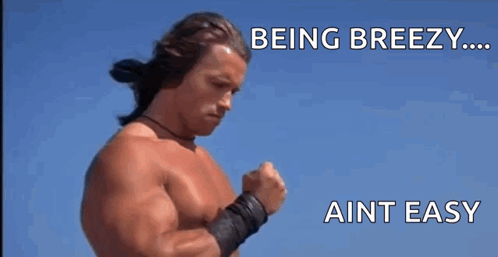 a shirtless arnold schwarzenegger is being breezy and ain t easy