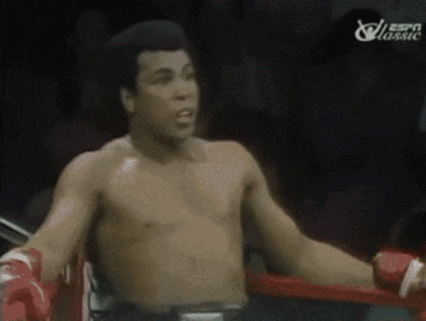 A Shirtless Boxer In A Boxing Ring With Espn Classic Written On The Bottom GIF