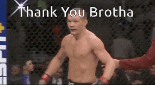 A Shirtless Fighter Stands In Front Of A Crowd With The Words Thank You Brotha GIF