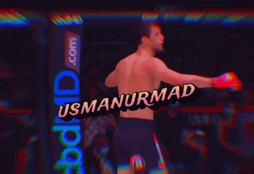 A Shirtless Fighter With The Name Usmanurmad On The Bottom GIF