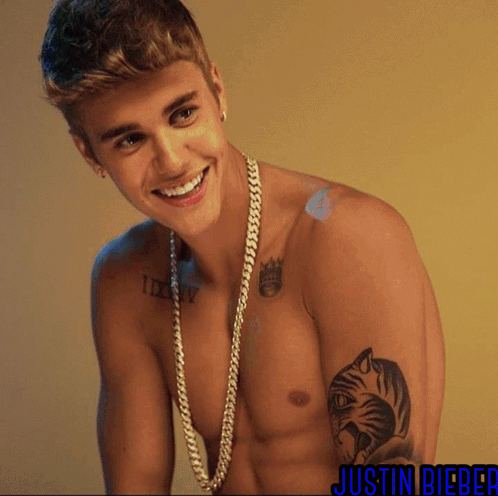 A Shirtless Justin Bieber With A Tiger Tattoo GIF