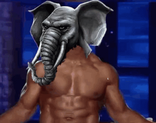 A Shirtless Man Has An Elephant Mask On His Face GIF