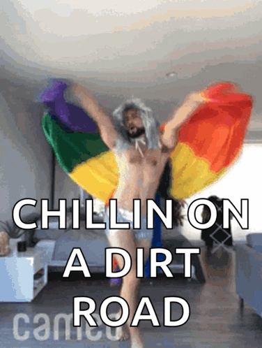 A Shirtless Man Holding A Rainbow Flag With The Words Chillin On A Dirt Road Above Him GIF