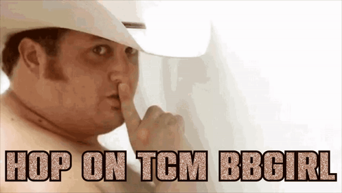 a shirtless man in a cowboy hat is covering his mouth with his finger and says hop on tcm bbcirl
